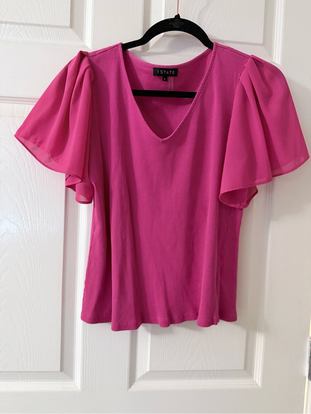 1. State Fuchsia Flutter Sleeve V-Neck Blouse